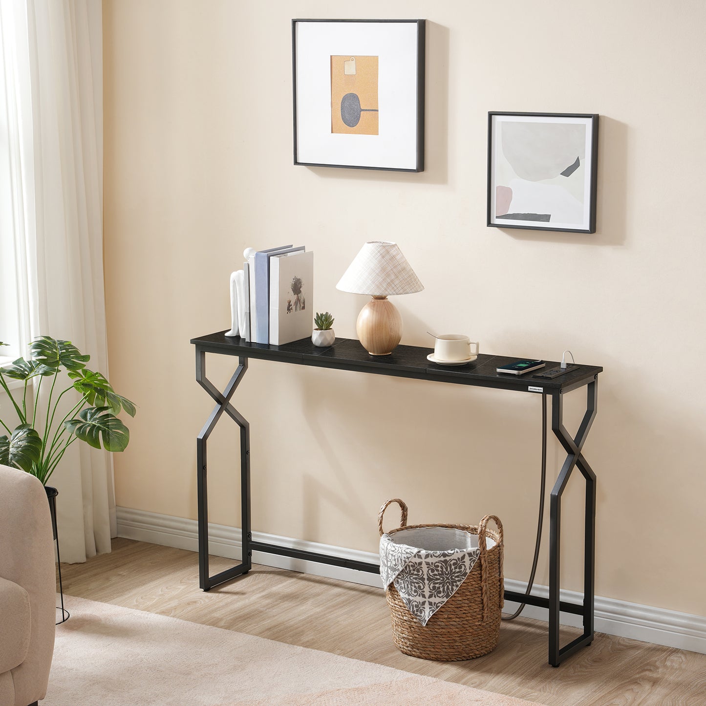 black console table to charge phone and lamp
