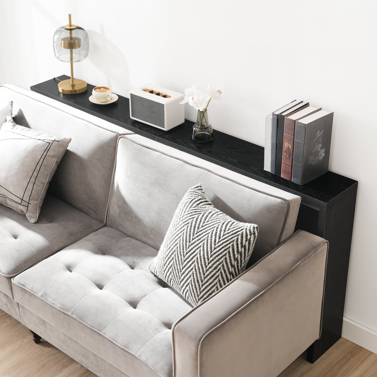 mahancris black wooden console table behind the sofa